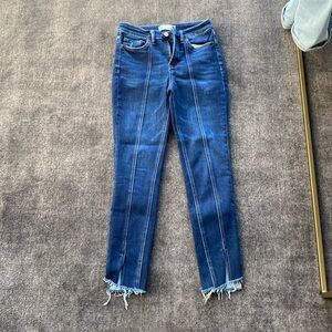 Dark wash blue jeans with slits